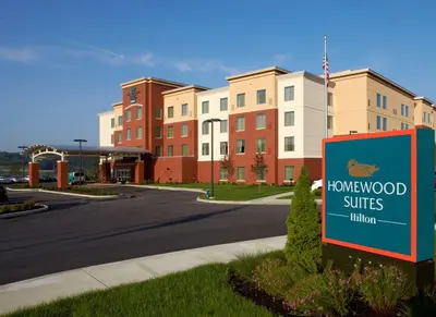a sign in front of a building with a townhood suites at Homewood Suites by Hilton Pittsburgh Airport/Robinson Mall Area in Moon Township