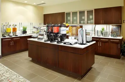 a kitchen with a counter with a coffee maker at Homewood Suites by Hilton Pittsburgh Airport/Robinson Mall Area in Moon Township