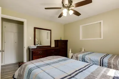 a bedroom with two beds and a ceiling fan at Pet-Friendly Ohio Escape with Deck and Community Dock! in Celina