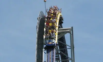 a group of people riding on a roller coaster at South Beach Resort Hotel in Marblehead