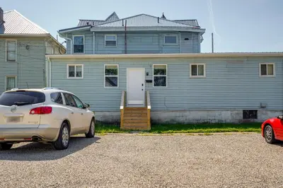 a silver car parked in front of a house at Zanesville Vacation Rental Near Downtown in Zanesville