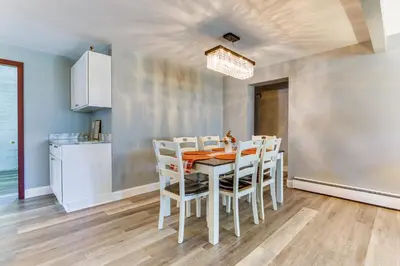 a kitchen and dining room with a table and chairs at Indian Lake Vacation Rental with Fire Pit and Sauna in Lakeview