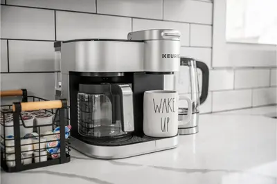a coffee maker sitting on top of a counter at Amazing Parma Home King Bed Full Office Room in Parma