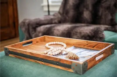 a wooden box on a table with a rope in it at Amazing Parma Home King Bed Full Office Room in Parma