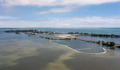 an island in the middle of a body of water at Beautiful Boathouse overlooking the Bay in Sandusky