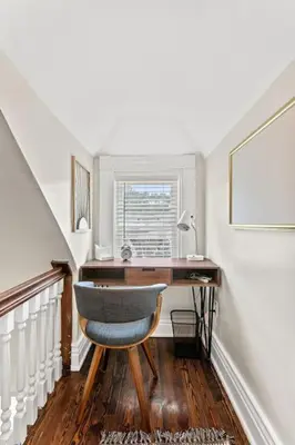 a home office with a desk and a chair at The Luxe/Hot Tub/12min to Horse Park/30 Min to Ark in Georgetown