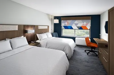 a hotel room with two beds and a window at Holiday Inn Express & Suites Dry Ridge by IHG in Dry Ridge