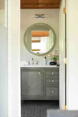 a bathroom with a sink and a mirror at Lake with Dock and Hot Tub Hocking Hills Cabin in Rockbridge