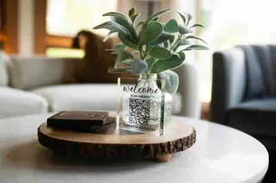 a vase with a plant in it on a table at Lake with Dock and Hot Tub Hocking Hills Cabin in Rockbridge