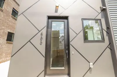 a door on the side of a house at Chic Retreats in Columbus in Columbus