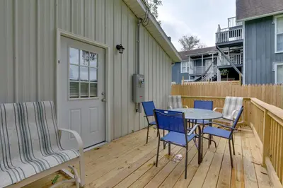 a patio with a table and chairs on a deck at Zanesville Vacation Rental 2 Mi to Downtown! in Zanesville