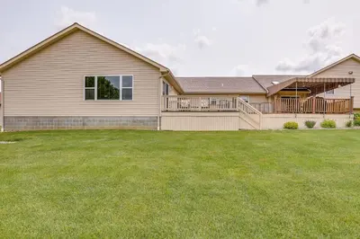 a large house with a large yard at WFH-Friendly Columbiana Vacation Rental with Deck! in Columbiana