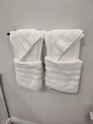 two stacks of towels are hanging in a refrigerator at Hickory House B & B in Hickory