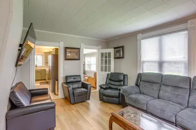 a living room with a couch and two chairs at Welcoming Port Clinton Vacation Rental! in Port Clinton
