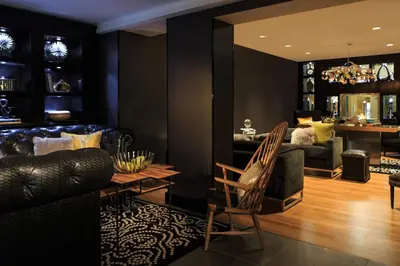 a living room with a couch and a table at Renaissance Cincinnati Downtown Hotel in Cincinnati