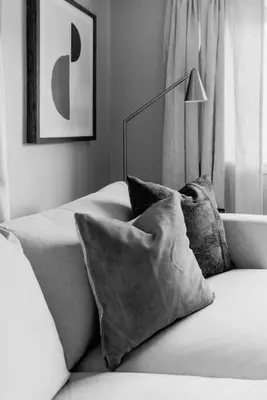 a black and white photo of a bed with pillows at Westlake Harmony in Westlake