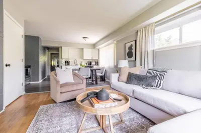 a living room with a couch and a table at Westlake Harmony in Westlake