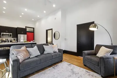 a living room with a couch and two chairs at Sleek Millersburg Apartment in Downtown! in Millersburg
