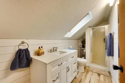 a bathroom with a sink and a shower at Lakefront St Marys Getaway with Boat Dock and Fire Pit in Southmoor Shores