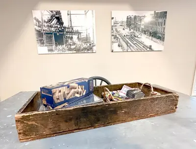a wooden box sitting on top of a table at Group House Sleeps 26 THE ATTIC - 2 Miles to Cedar Point in Sandusky