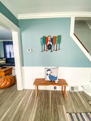a room with a bench with a penguin on it at Historic District Vermilion Home in Vermilion