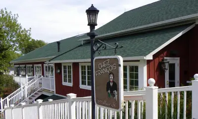 a sign on a street light in front of a house at Historic District Vermilion Home in Vermilion