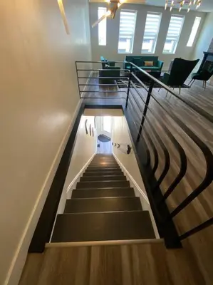 a spiral staircase in a room with a stair case at Modern & Luxurious 1 Bedroom in the Heart of Short North in Columbus
