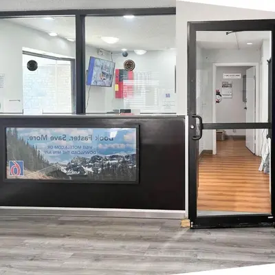 an open door in a building with a sign on it at Studio 6 Suites Dayton OH Englewood in Dayton