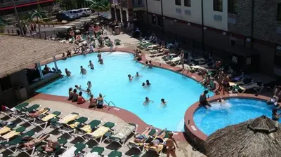 a group of people in a large swimming pool at Put-in-Bay Resort & Conference Center in Put-in-Bay