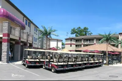 a row of buses parked in a parking lot at Put-in-Bay Resort & Conference Center in Put-in-Bay