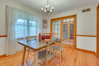 a dining room with a wooden table and chairs at Pet-Friendly Union Vacation Rental with Pool! in Union