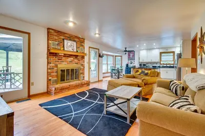 a living room with a couch and a fireplace at Pet-Friendly Union Vacation Rental with Pool! in Union