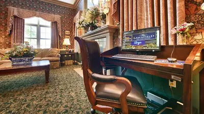 a computer sitting on a desk in a room at Best Western Plus Mentor-Cleveland Northeast in Mentor