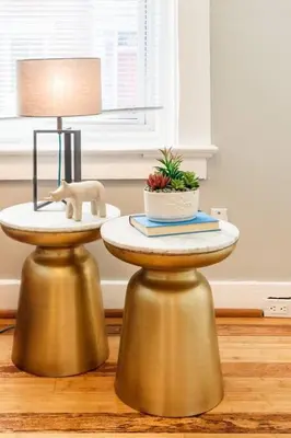 a table with a cat statue on top of it at 2 Large Apts w Parking - Downtown Over the Rhine in Cincinnati