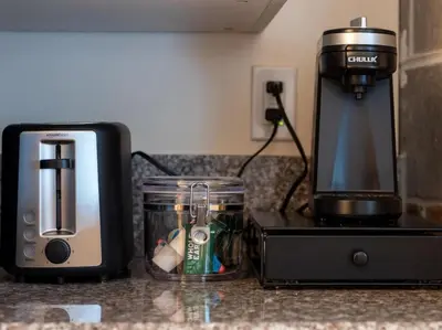 a kitchen counter with a coffee maker and a blender at Luxury Townhome in Heart of Over the Rhine in Cincinnati