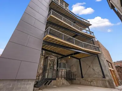 a building with balconies on the side of it at Findlay Suites - Perfect Location Over the Rhine in Cincinnati