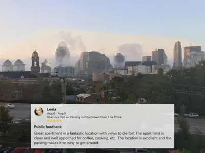 a sign in front of a city with smoke at Spacious Home Walk to Everything and FREE Parking in Cincinnati