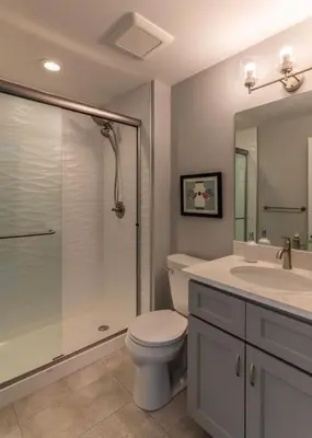 a bathroom with a toilet and a shower and a sink at TRUTH Old world charm meets New world love in Cincinnati