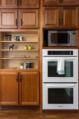 a kitchen with a white oven and a microwave at Deluxe 6 Bedroom 3 Min to Downtown w 2-car Driveway in Cincinnati