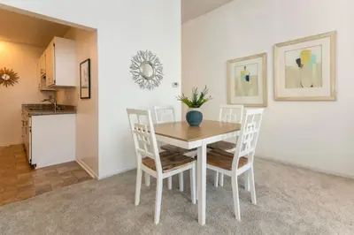 a dining room with a table and chairs at Adorable MtAdams 2BR near it all in Cincinnati