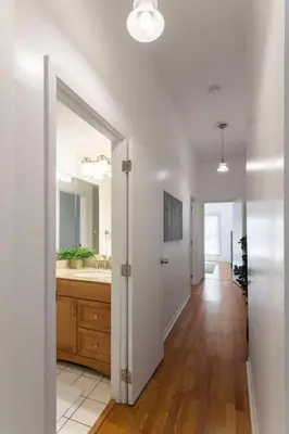 a bathroom with a sink and a mirror at Adorable MtAdams 2BR near it all in Cincinnati