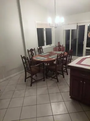 a dining room with a table and chairs at 4BR Home - Pets Allowed by ARK Experience in Williamstown
