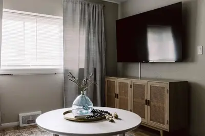 a room with a table with a vase on it at NEWLY Listed! Westlake Stylish in Westlake