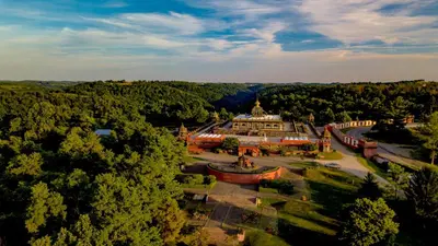 an aerial view of a building in a forest at Giriraja Ashraya in Moundsville