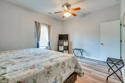 a bedroom with a bed and a ceiling fan at Kentucky Retreat Near Williamstown Lake! in Williamstown