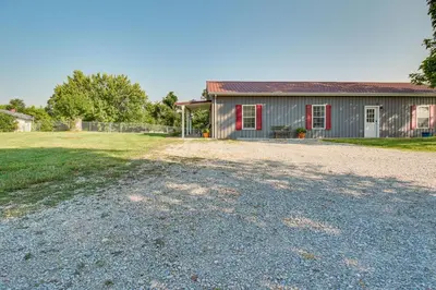 a gravel driveway in front of a house at Kentucky Retreat Near Williamstown Lake! in Williamstown