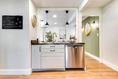 a kitchen with a sink and a counter at 7 Mi to Mounds State Park Indiana Home with Porch! in Daleville