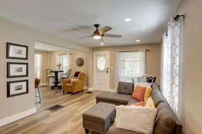 a living room with a couch and a ceiling fan at Welcoming Willoughby Home 1 Mi to Historic Dtwn in Willoughby