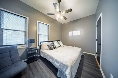 a bedroom with a bed and a ceiling fan at Little Italy Gem Close to CWRU, Cleveland Clinic & Top Restaurants w King Bed in Cleveland