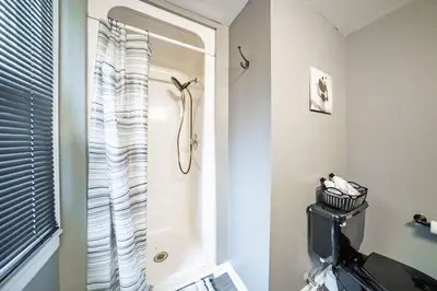a shower stall in a bathroom with a toilet at Little Italy Gem Close to CWRU, Cleveland Clinic & Top Restaurants w King Bed in Cleveland